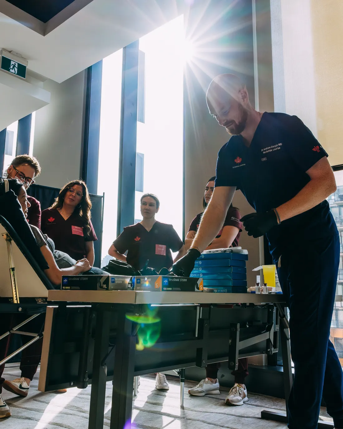 Faculty and course participants during a supervised clinical training session